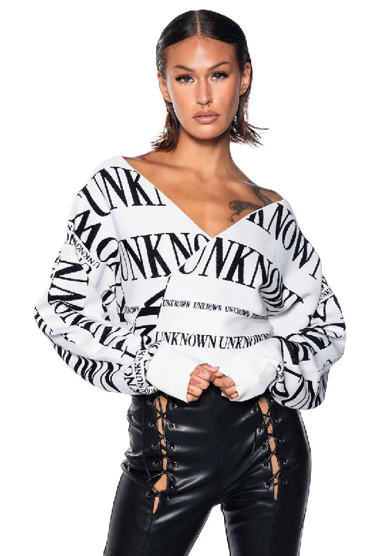 Bold and beautiful clothing for every woman   UNKNOWN LONG SLEEVE WRAP SWEATER